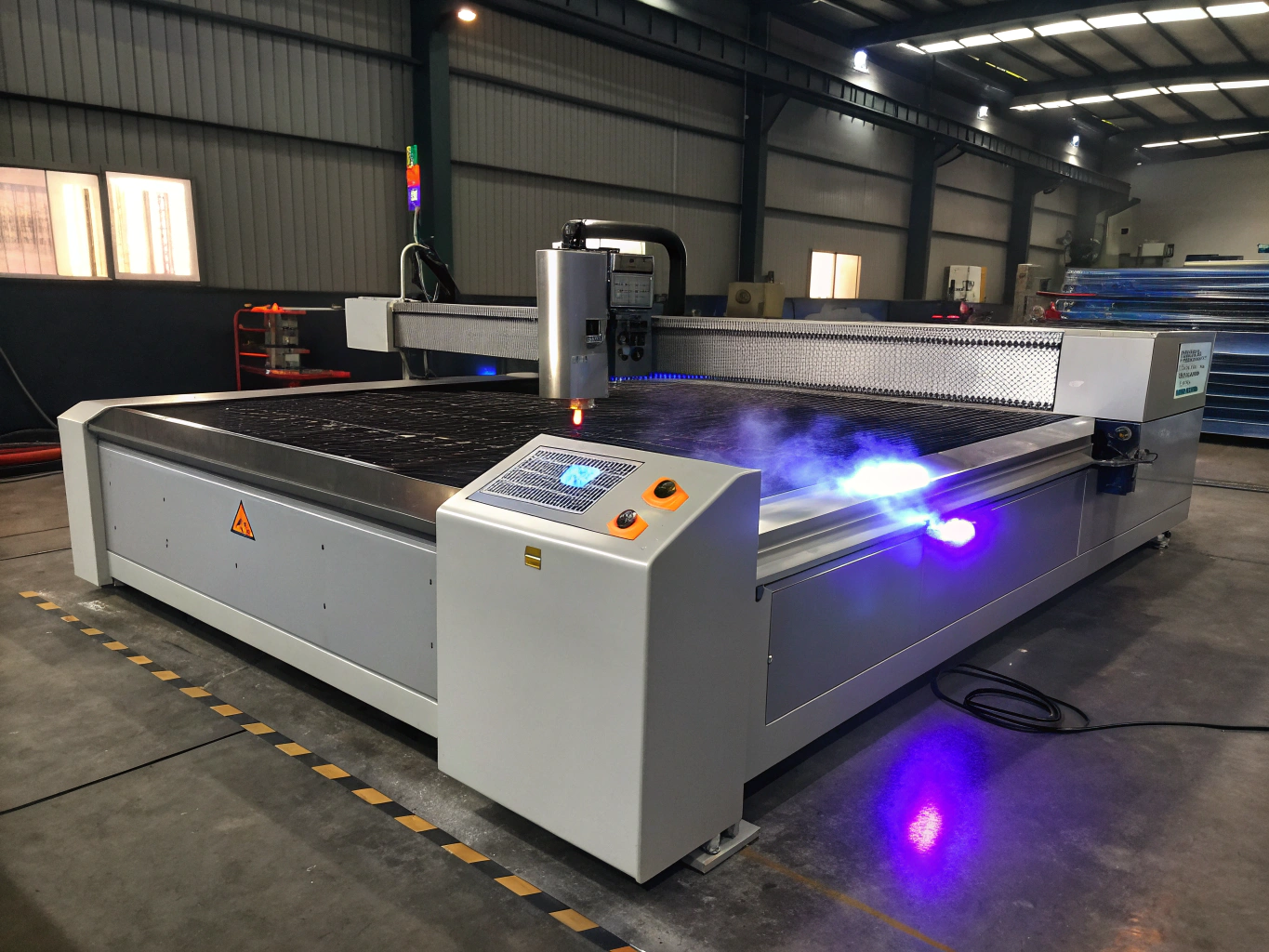 CNC fiber laser cutting machine fabricating generator frame steel in workshop